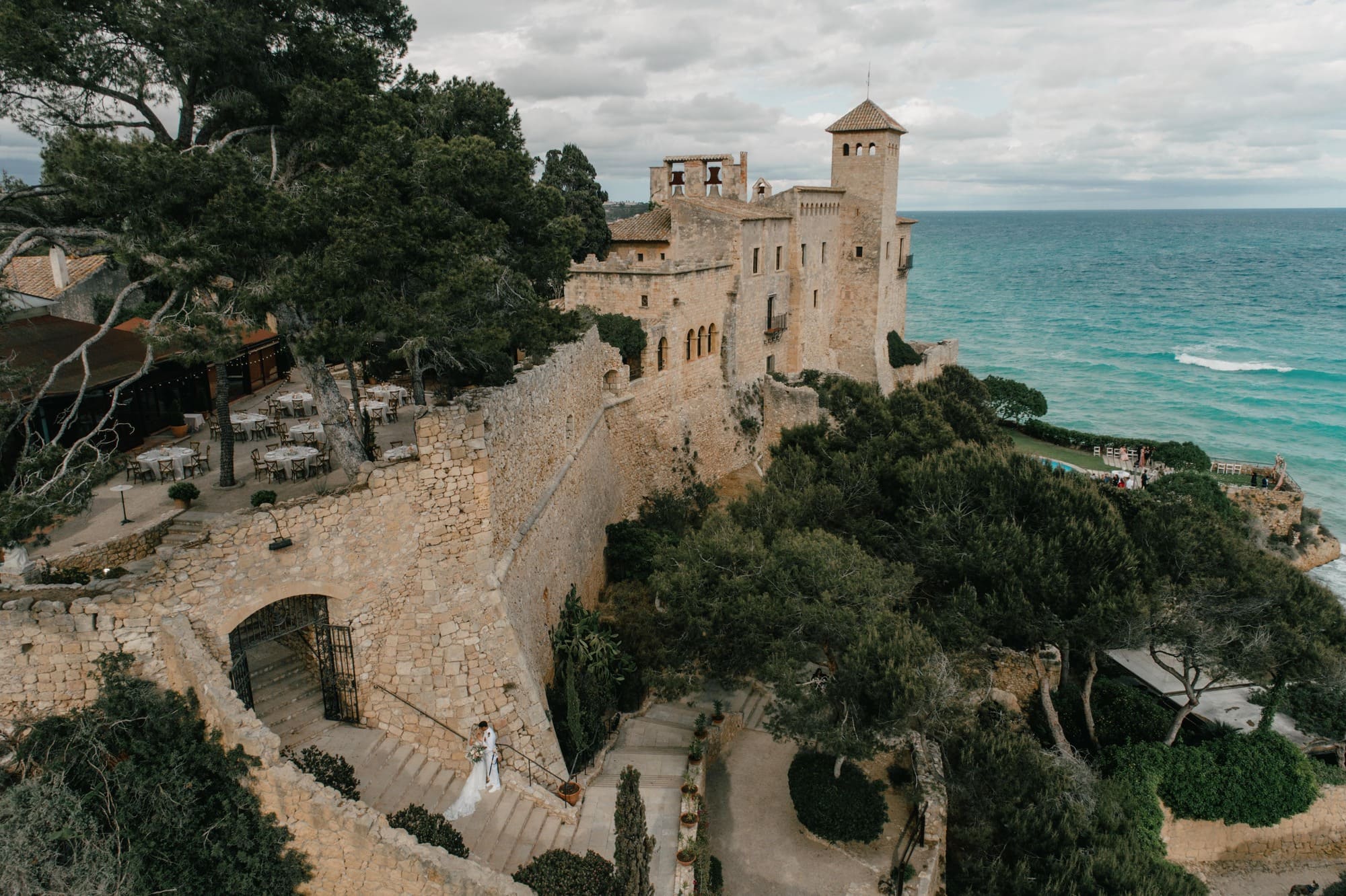 Castell Tamarit rising above the turquoise Mediterranean